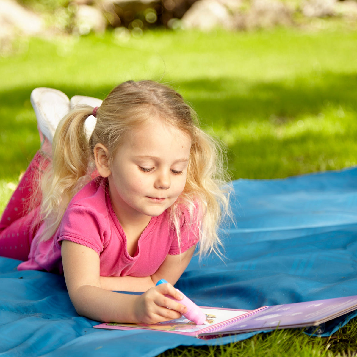 Melissa & Doug Water Wow! Fairy Tale – child playing with the pad