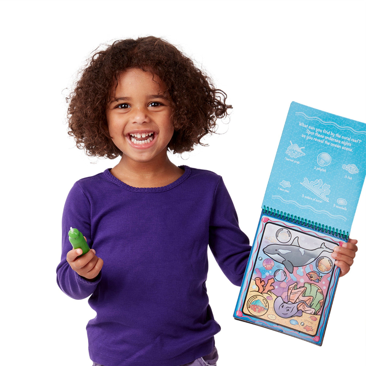 Melissa & Doug Water Wow! Animals – child holding the pad to show its size
